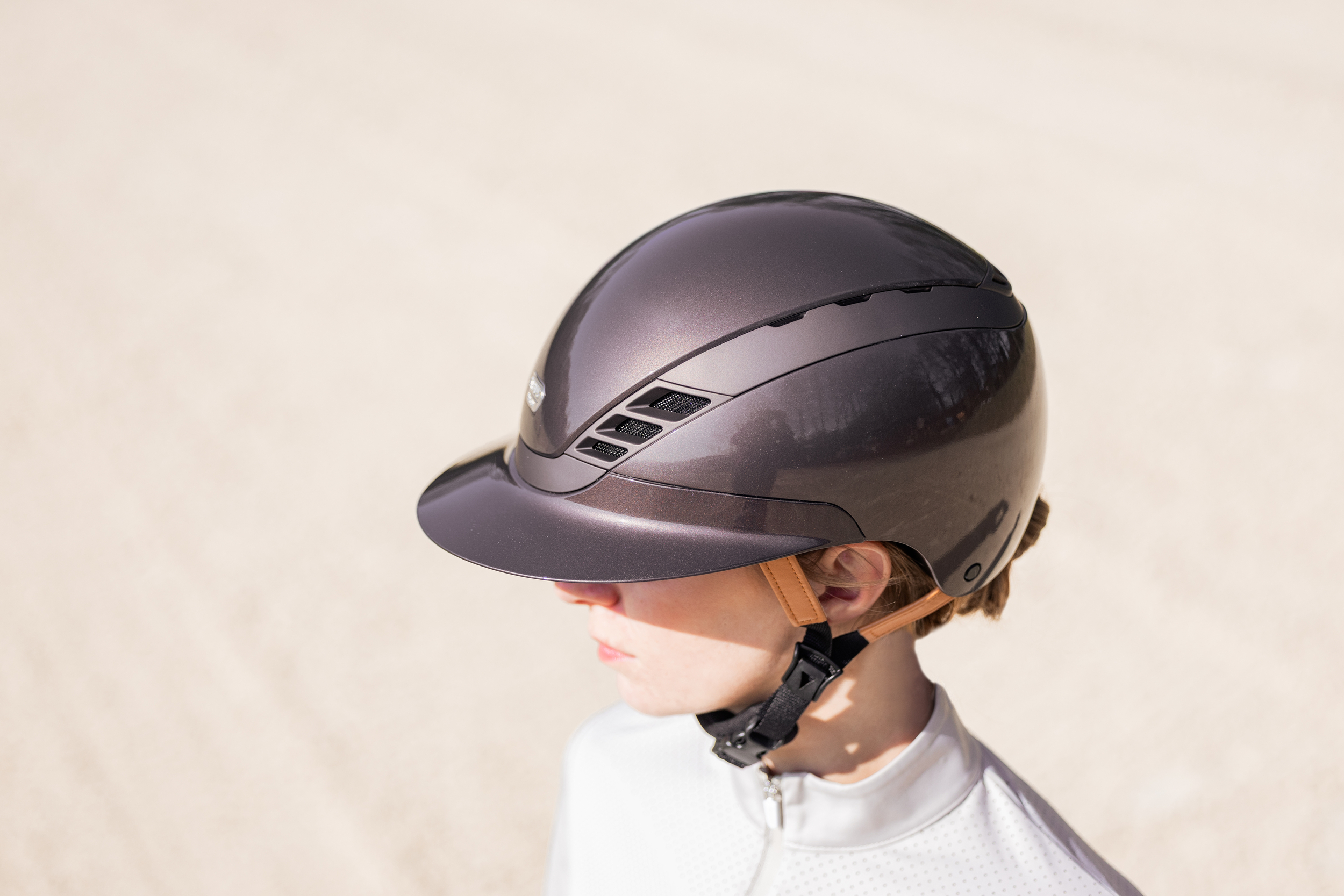 equestrian helmet, helmet, brown helmet, riding helmet, child rider